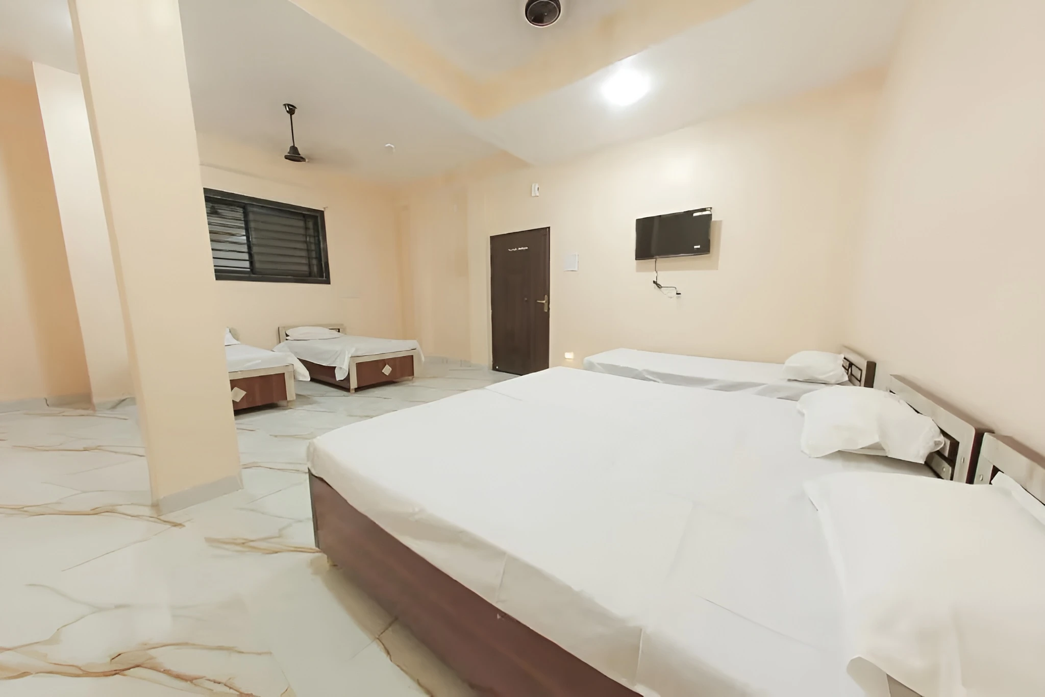 Twin beds with television